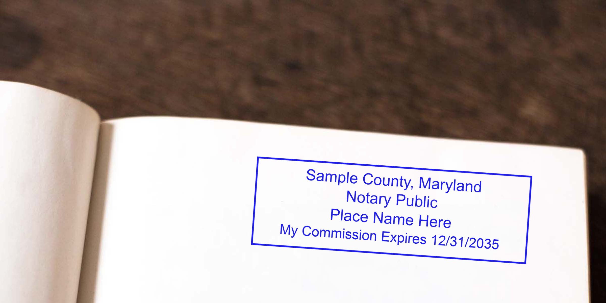 Maryland notary stamp on paper with commission expiration date and Maryland notary public seal.
