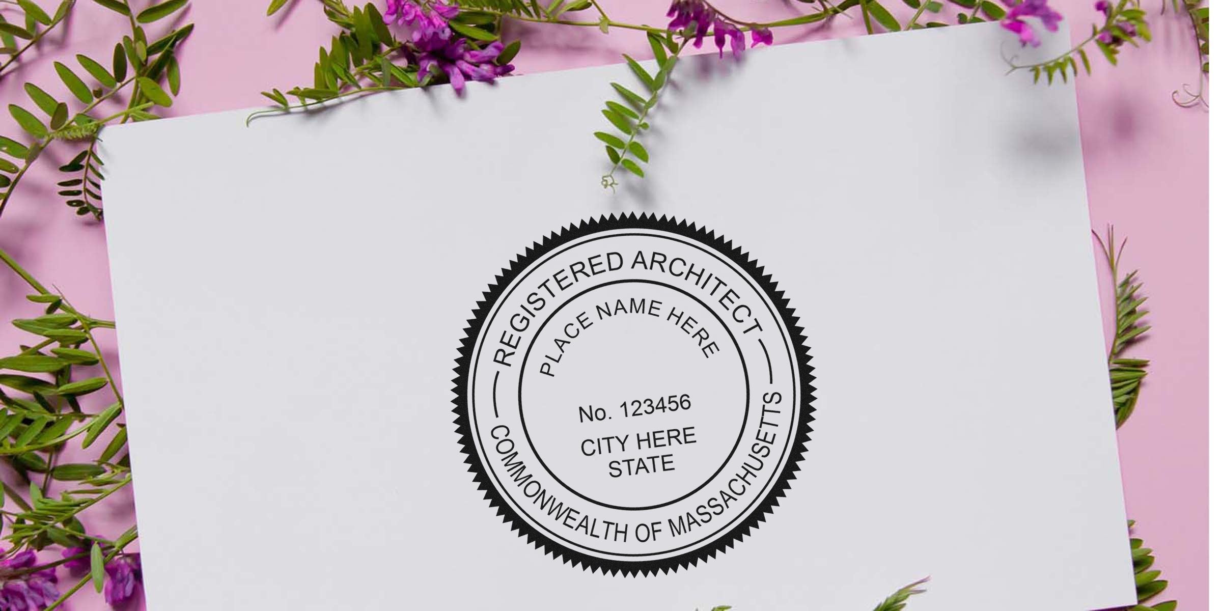 Massachusetts architect seal embosser on white paper with purple flowers and green leaves, a reliable tool for authenticating documents.