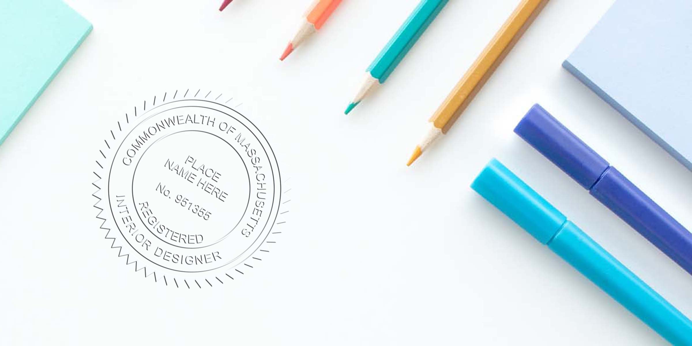 Commonwealth of Massachusetts stamp for registered interior designer, shown with colored pencils and markers on white background, symbolizing creative design inspiration.