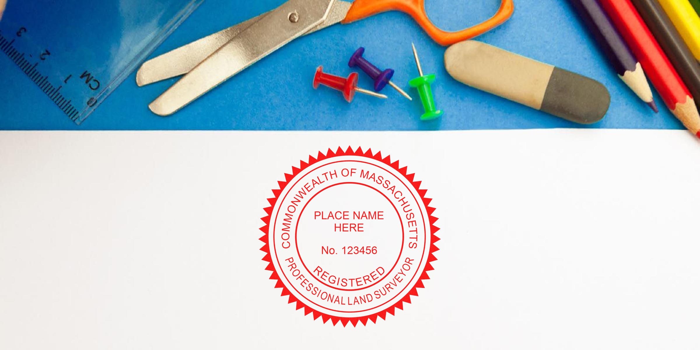 Massachusetts land surveyor stamp on white paper with office supplies, showing Commonwealth of Massachusetts registered professional land surveyor seal and online certification details.