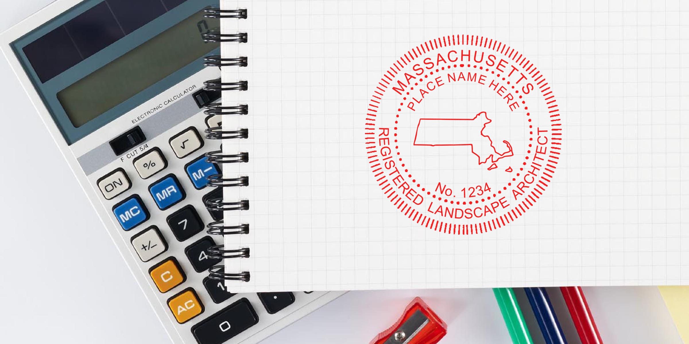Massachusetts landscape architect seal stamped on notebook with calculator and colored pencils, showing the process of getting a landscape architect seal in MA.