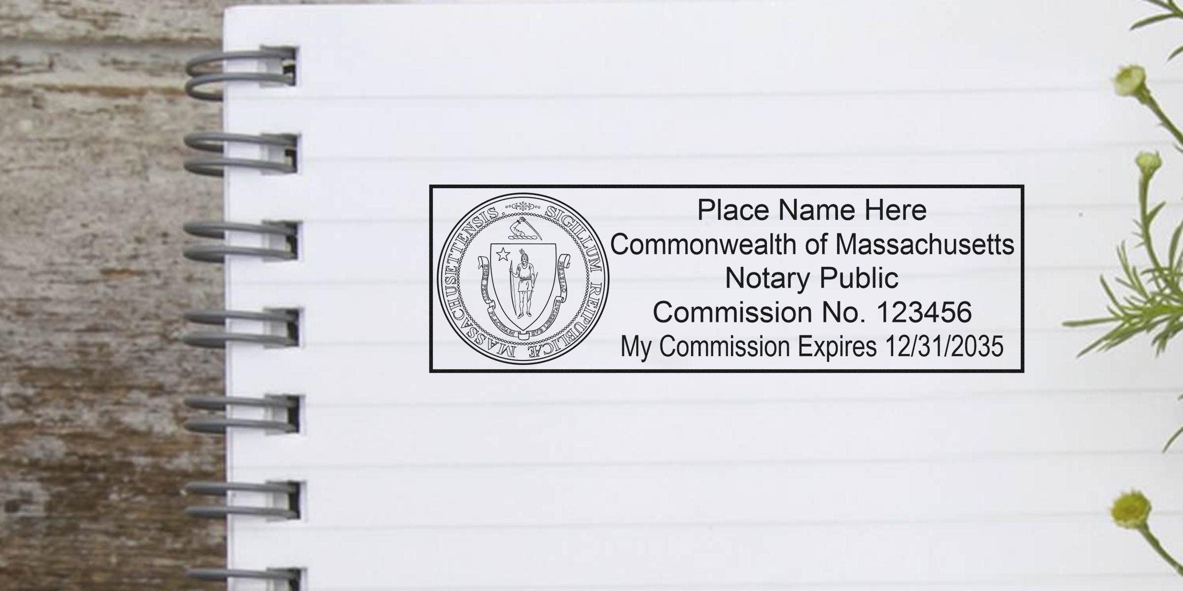 Massachusetts notary stamp with commission number and expiration date on a notebook page, perfect for buyers seeking notary supplies.