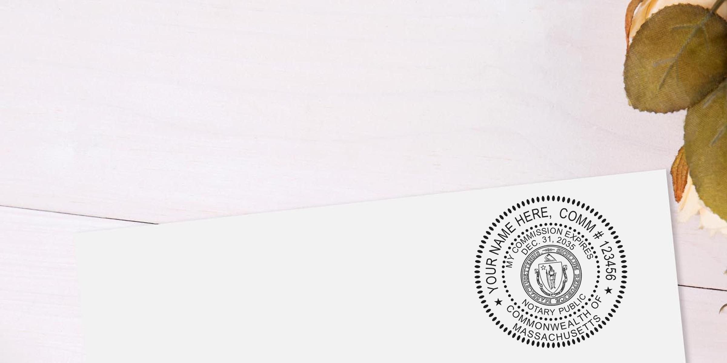 Massachusetts notary stamp on white paper with autumn leaves background, showing a Massachusetts notary seal.