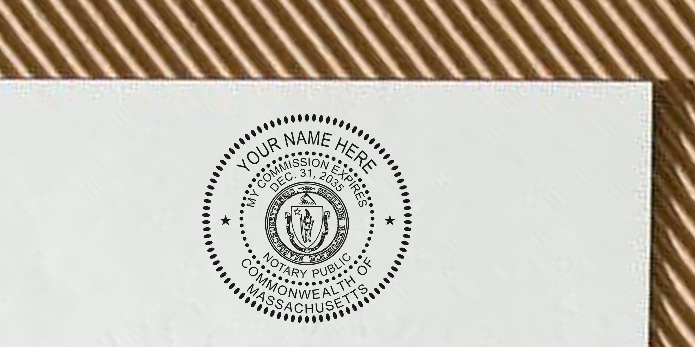 Massachusetts notary public seal on official document with commission expiration date, alongside MA notary supplies and essential tools.
