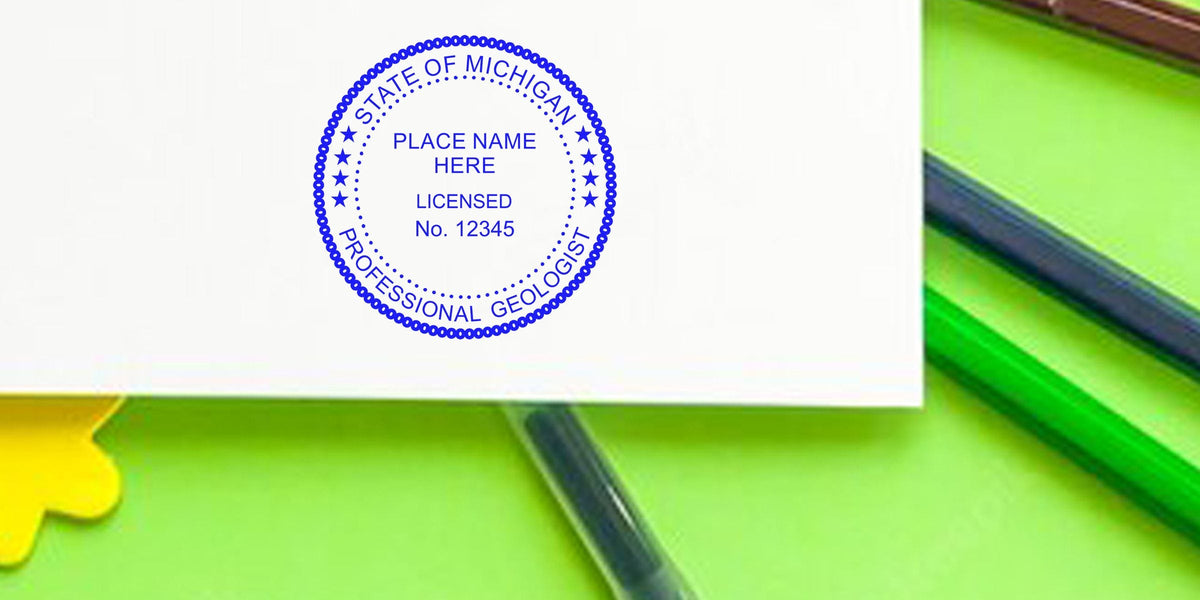 Michigan Geologist Stamp on white paper with green-yellow background, showing official Michigan professional geologist license and meeting all Geologist Stamp Requirements.