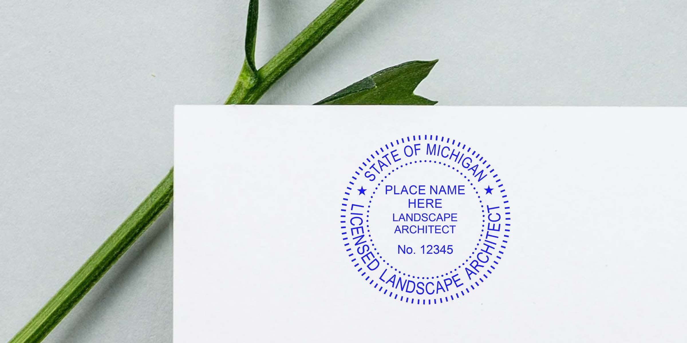 Michigan landscape architect stamp on white paper with green leaf background, including guidelines on stamp size.