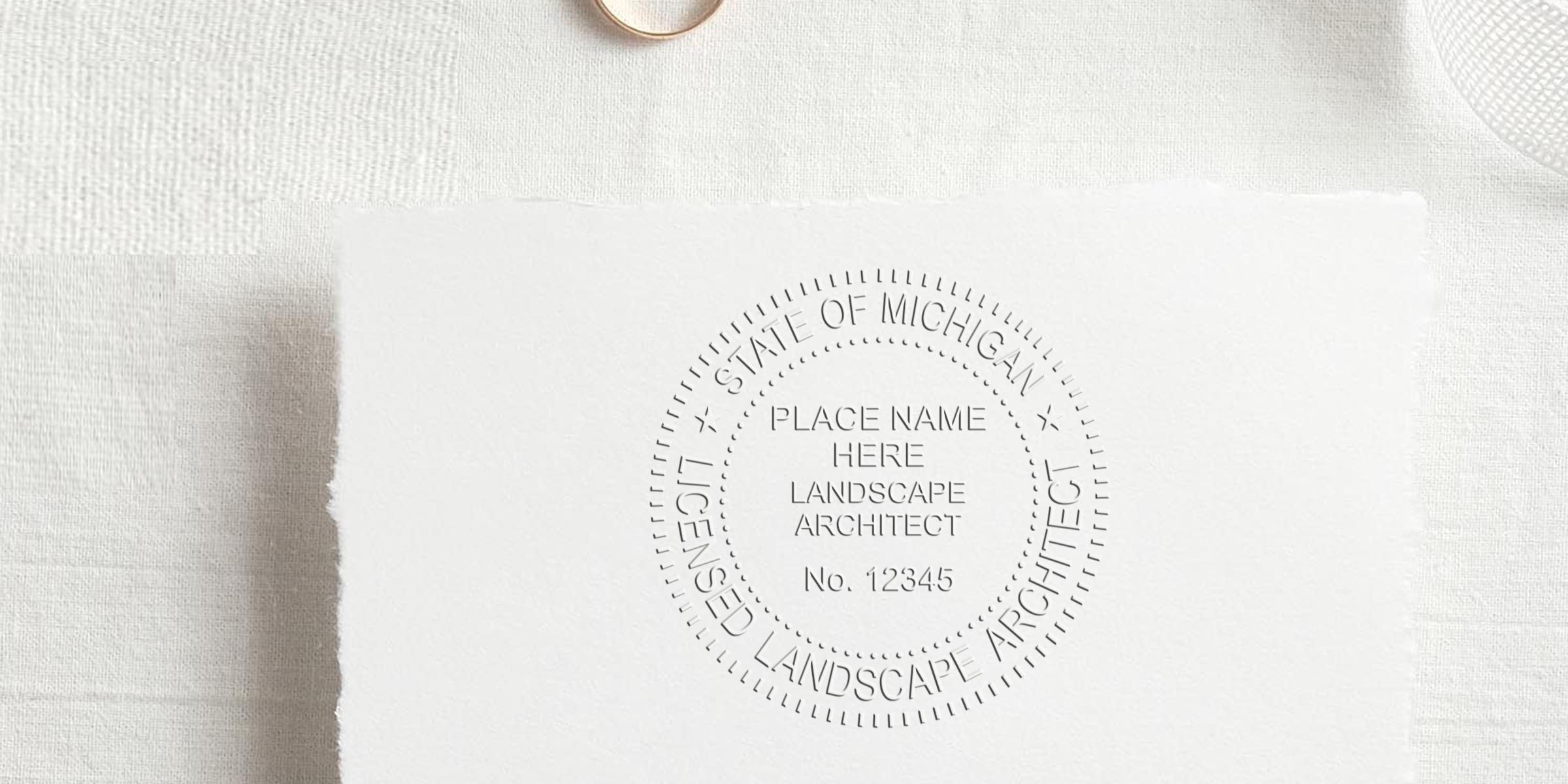 Embossed Michigan licensed landscape architect seal on white textured paper, featuring the official stamp; available for order.