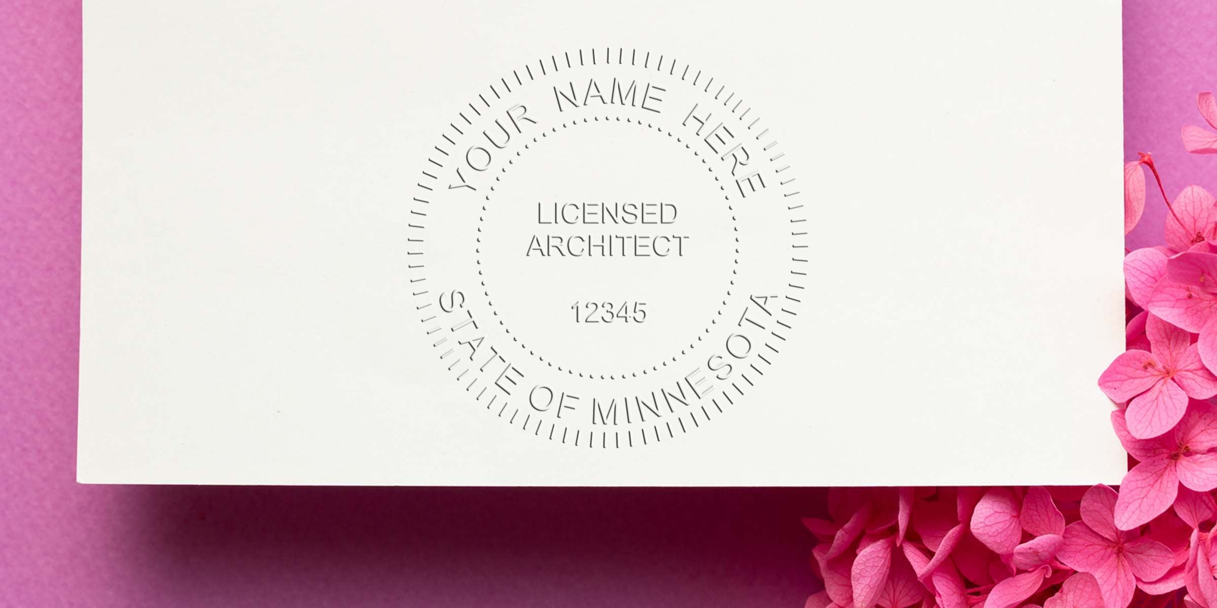 Minnesota architect stamp embossed on white paper with pink flowers, showing a licensed architect seal; perfect for buying an architect stamp online.