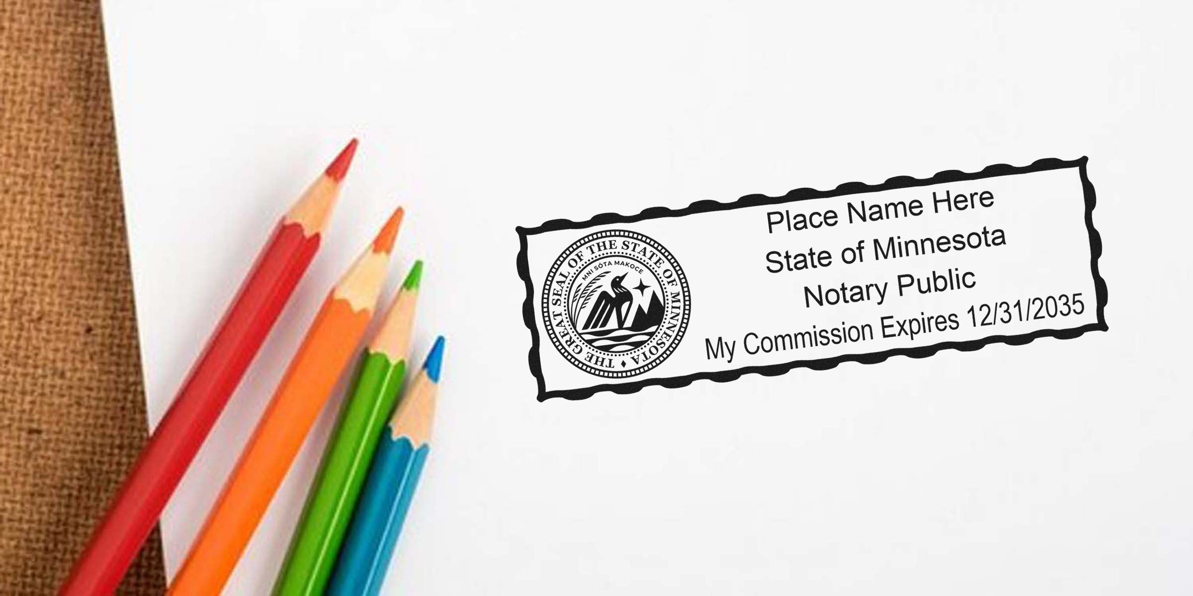 Minnesota notary seal stamp with commission expiration date next to colorful pencils on white paper, illustrating Minnesota notary public rules.