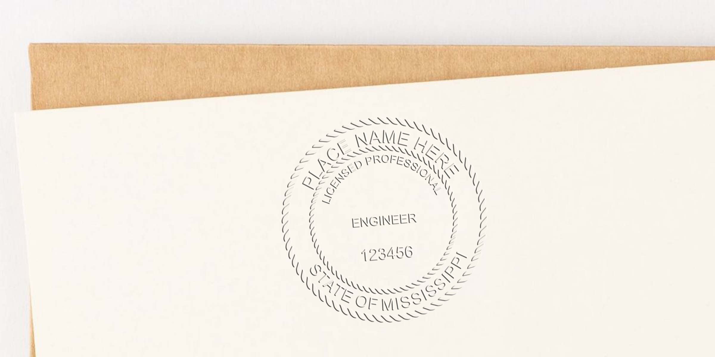 Custom Mississippi engineer seals with a licensed professional engineer embossed on white paper, set against a brown envelope background.