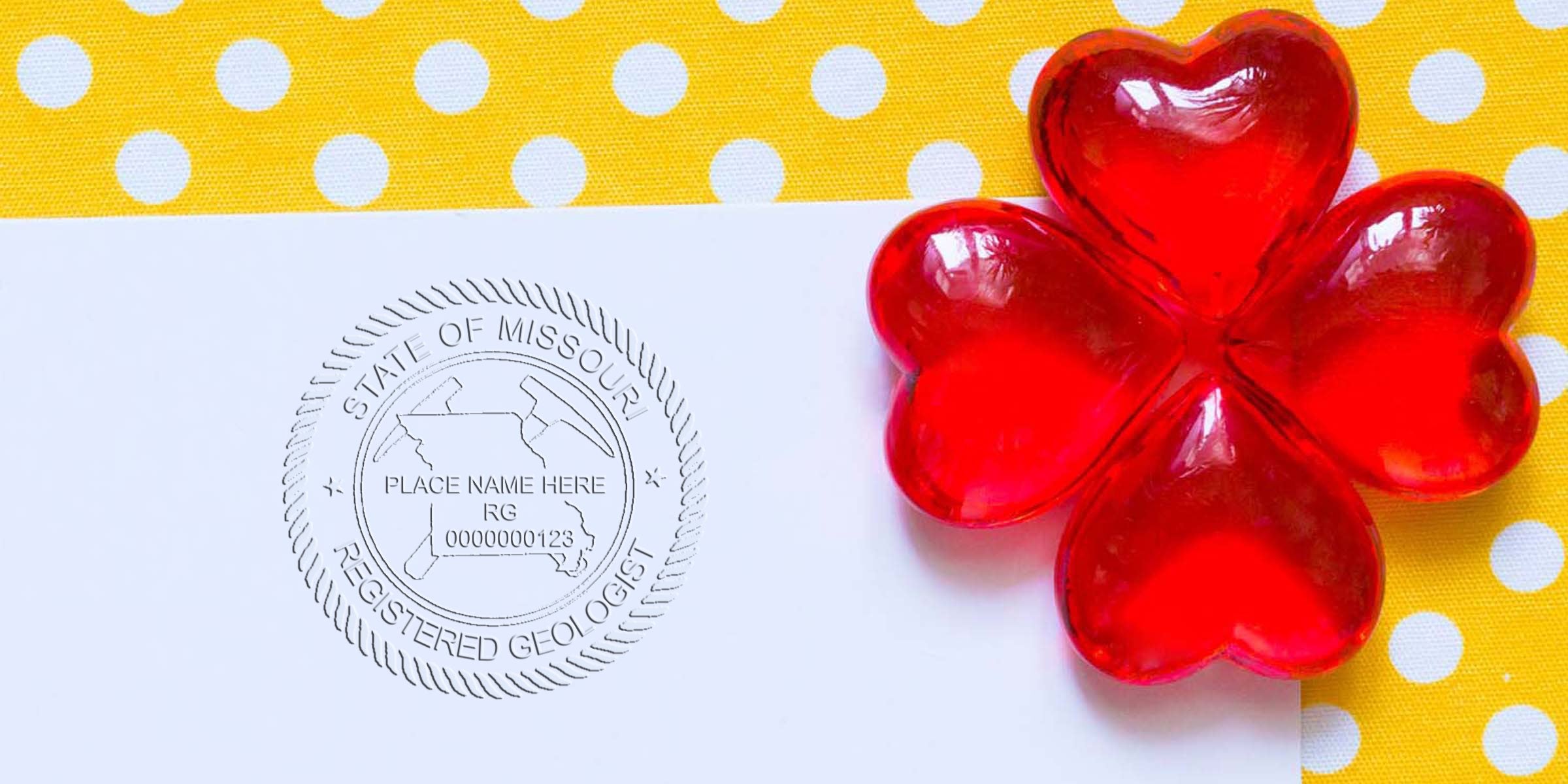 Missouri Geologist Seal embossed on white paper with red heart decorations on a yellow polka dot background, symbolizing Missouri Geology Certification.