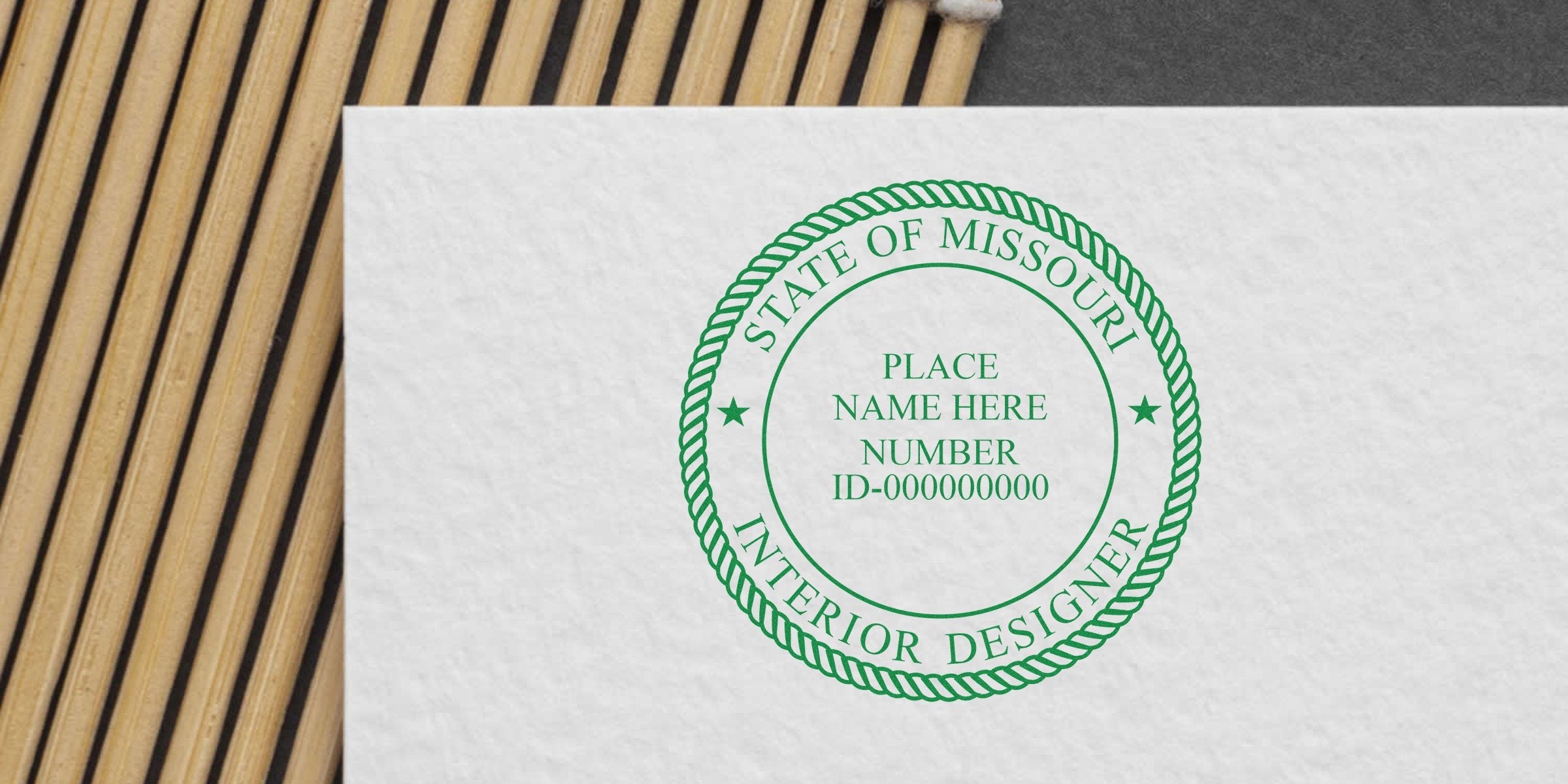 Custom Interior Designer Stamp with Missouri Interior Design Seal on white paper.