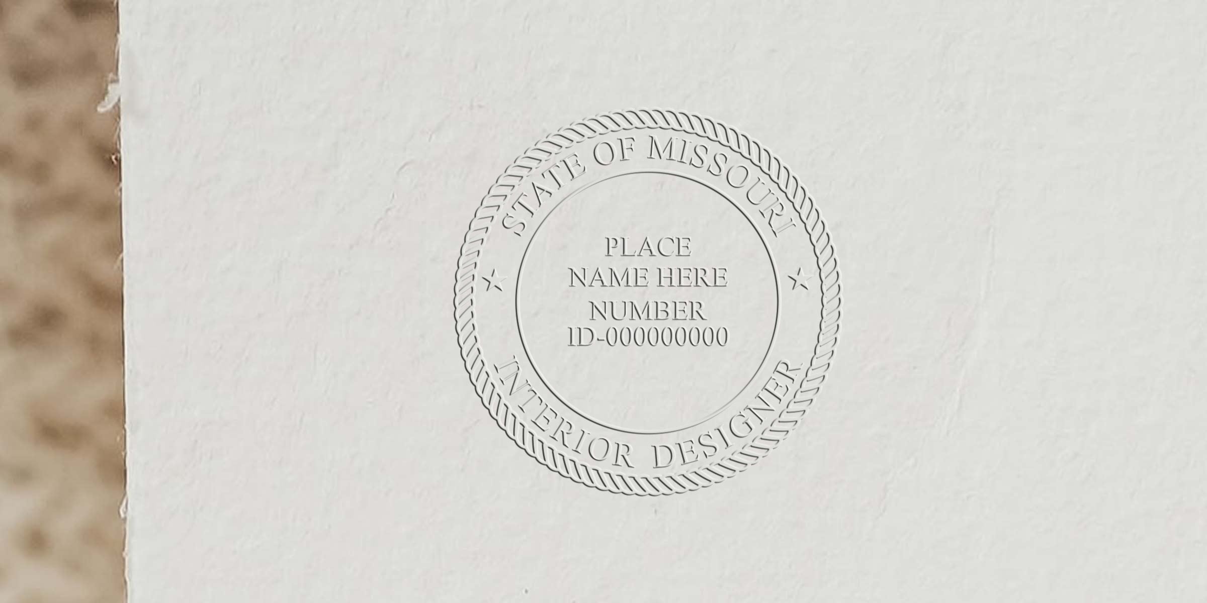 Embossed Missouri interior designer seal on white paper for certification and licensing, with tips for purchasing the seal.
