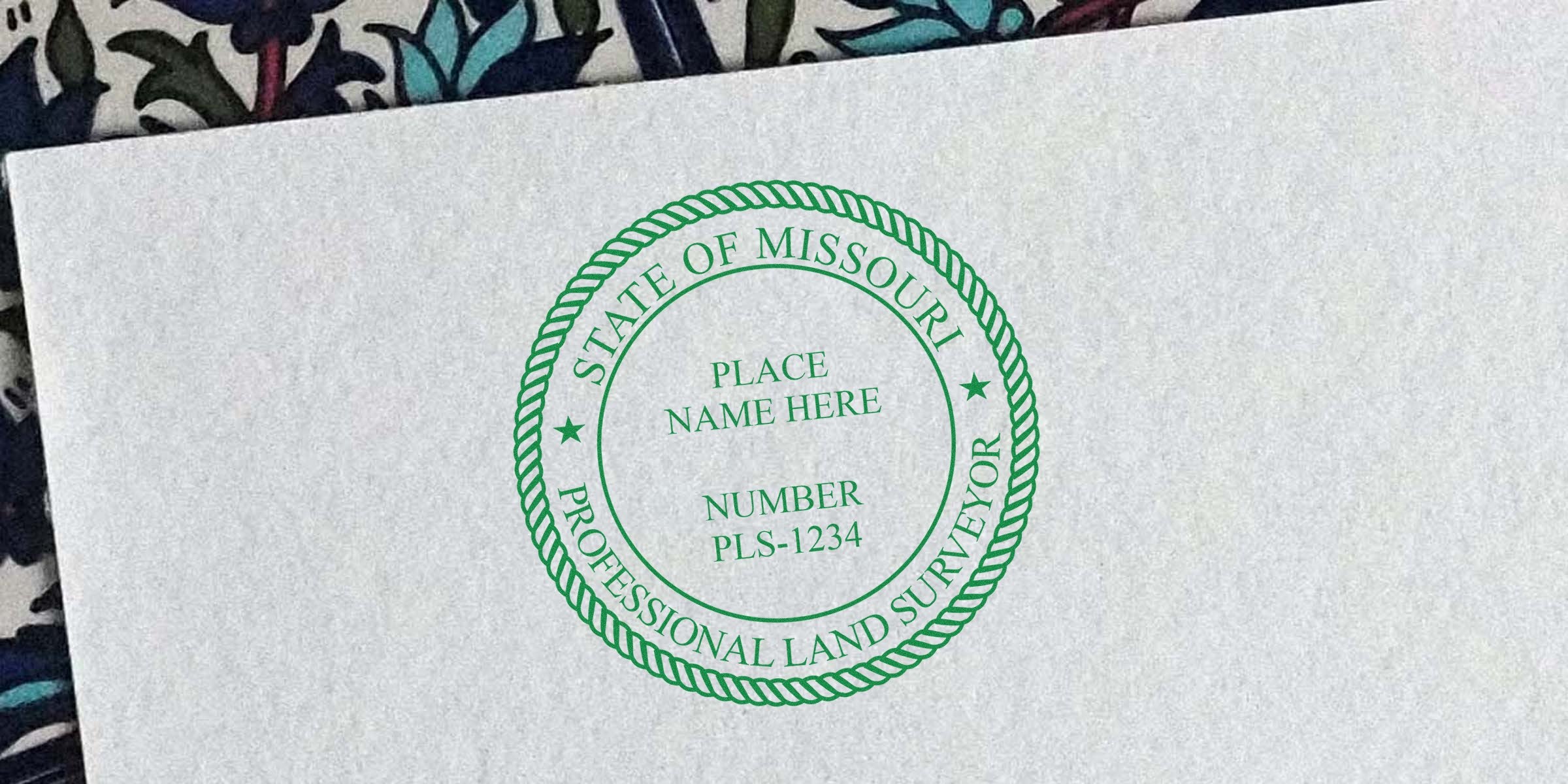 Missouri land surveyor stamp on white paper meets requirements for certified survey documents.