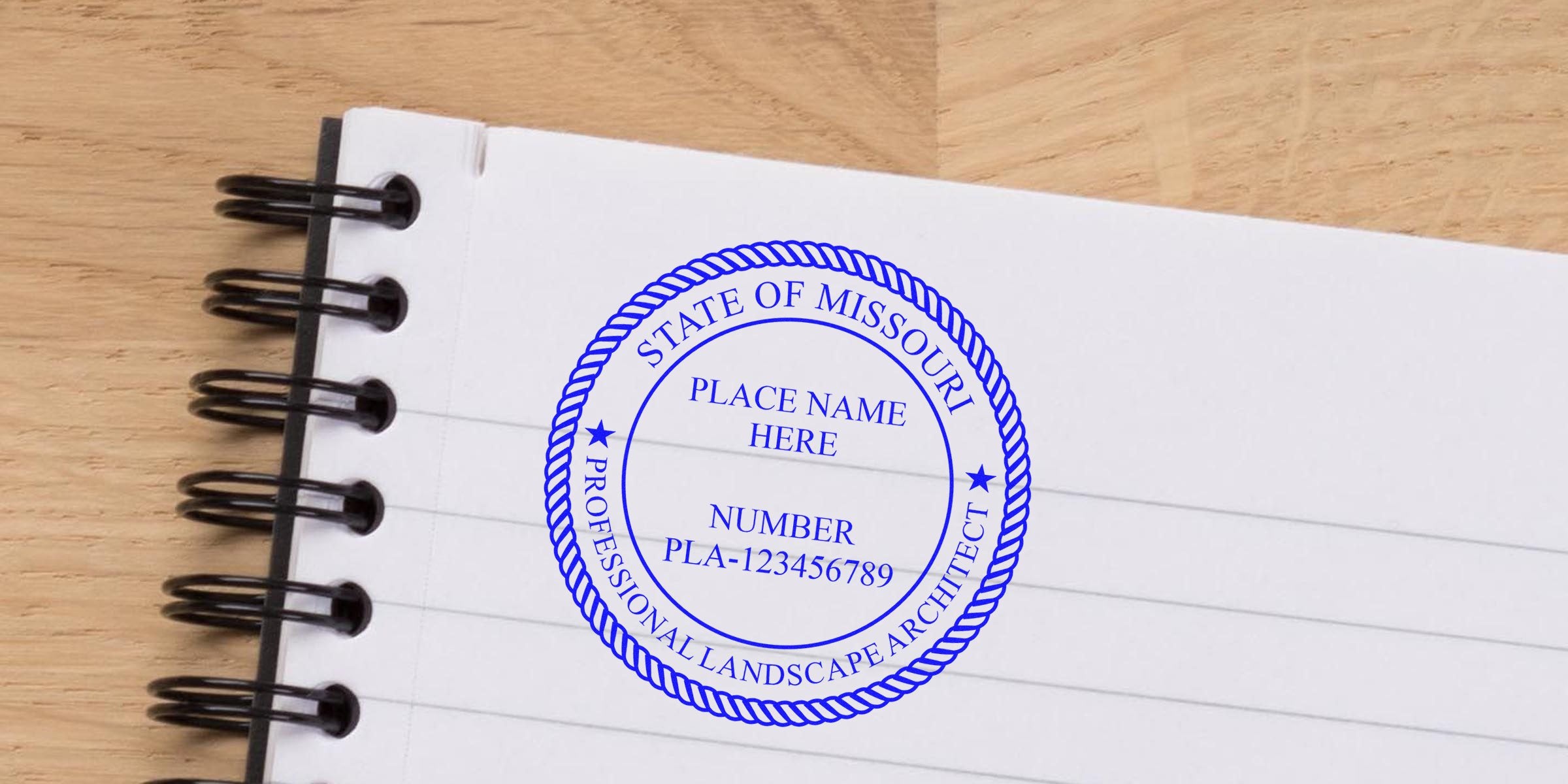 Missouri landscape architect seal embossed on notebook paper with license number PLA-123456789, made using Missouri seal embossers.