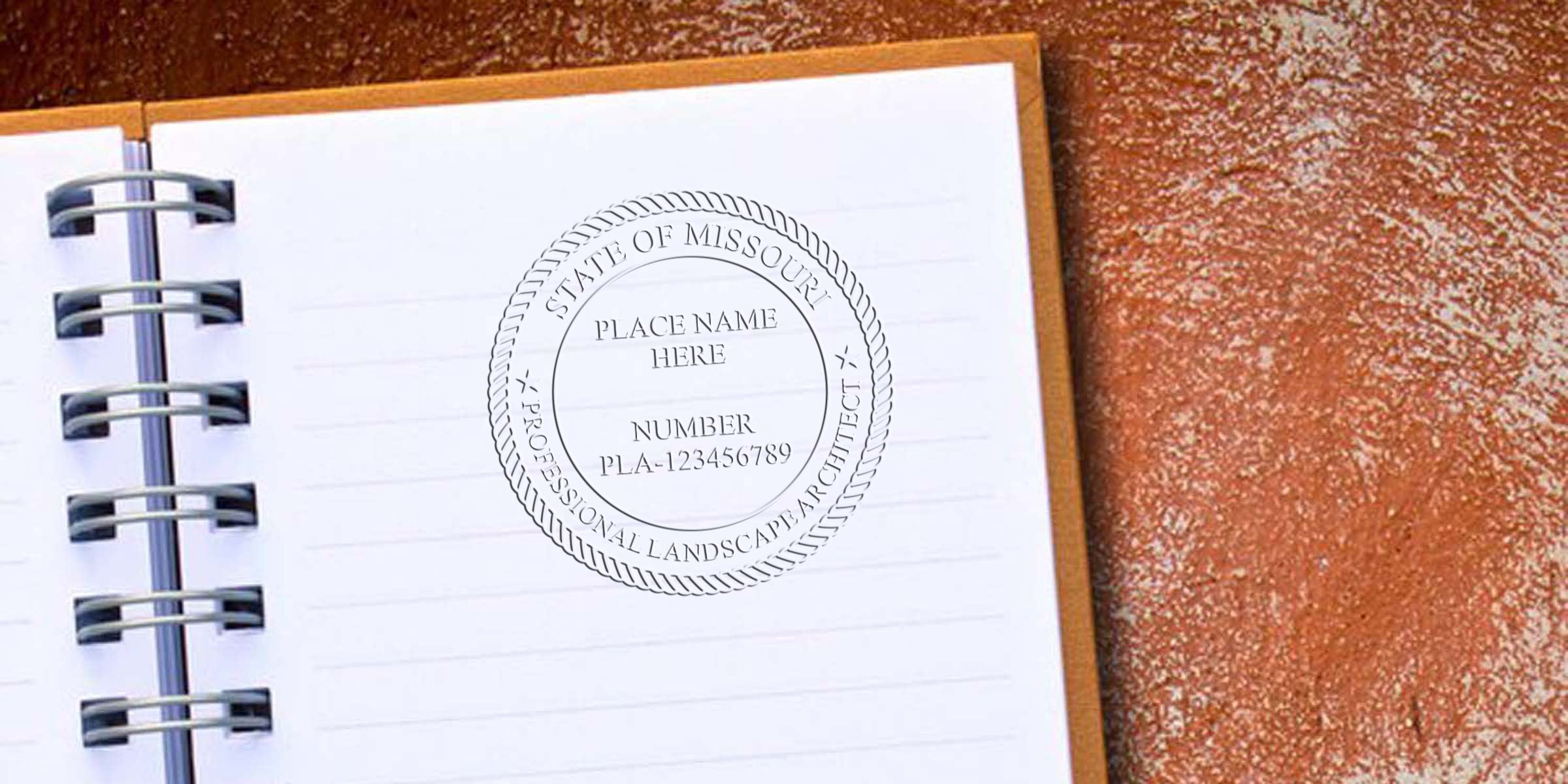 Missouri Landscape Architect Seal stamped on notebook page for licensing verification and certification.