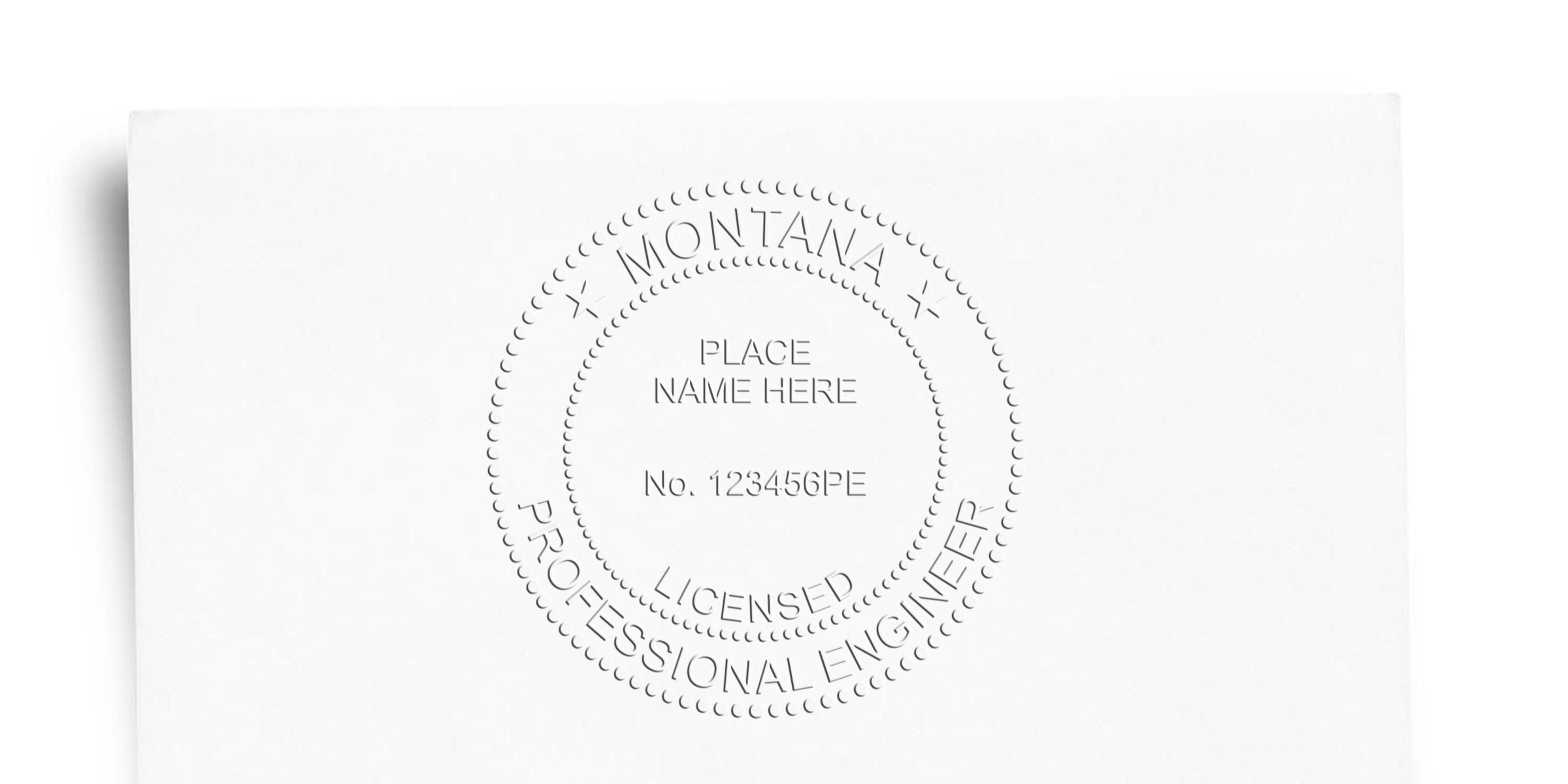 Montana engineering seal embossed on white paper, highlighting the key design elements of a licensed professional engineer’s seal.