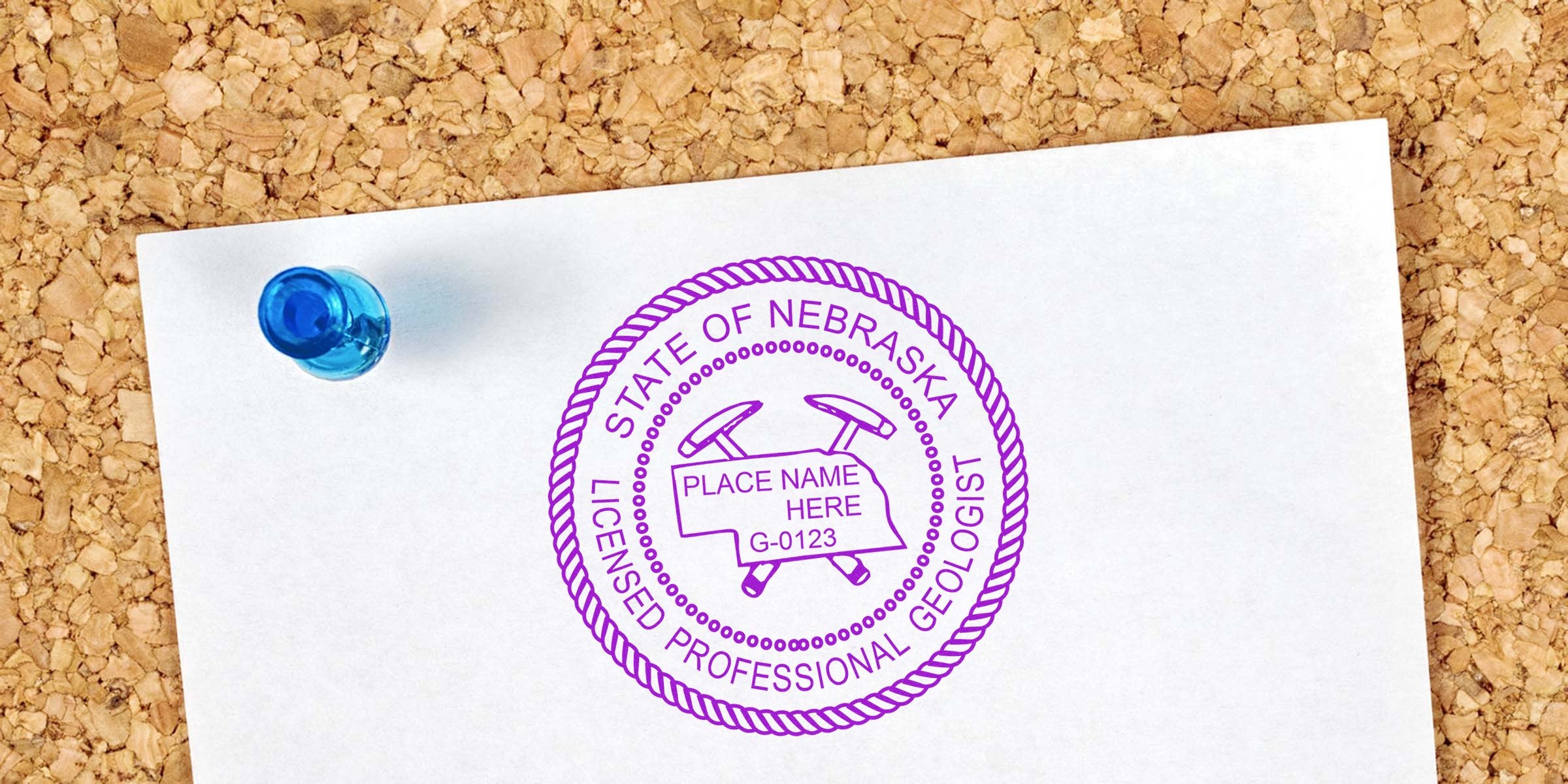 Nebraska Geological Stamp with licensed professional geologist seal on white paper pinned to corkboard, also called Geologist Stamp Nebraska.