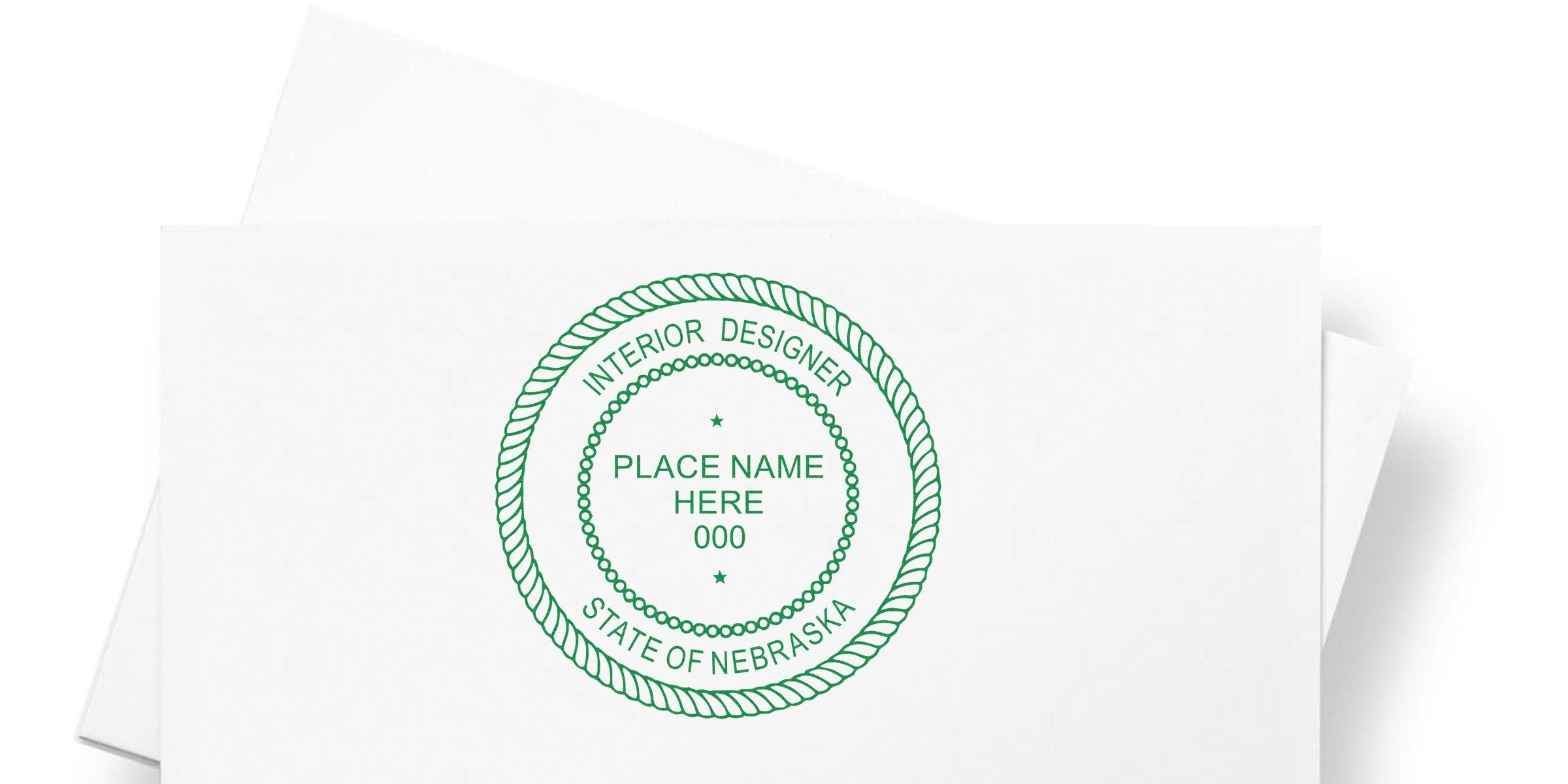 Custom stamp design on white paper for Nebraska interior design branding.