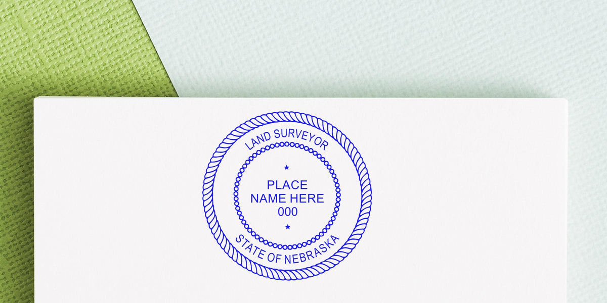 Nebraska land surveyor stamp on white paper, made by a land surveyor stamp maker for official survey documents.