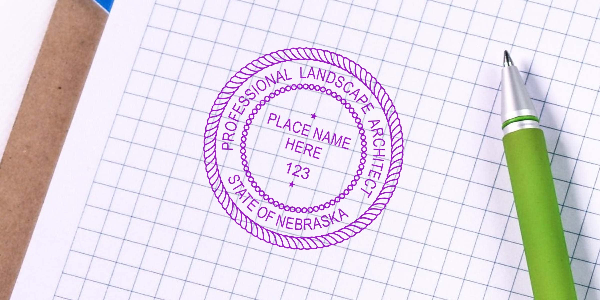 Nebraska landscape architect stamp on graph paper with green pen, showcasing the official state seal and design ideas.