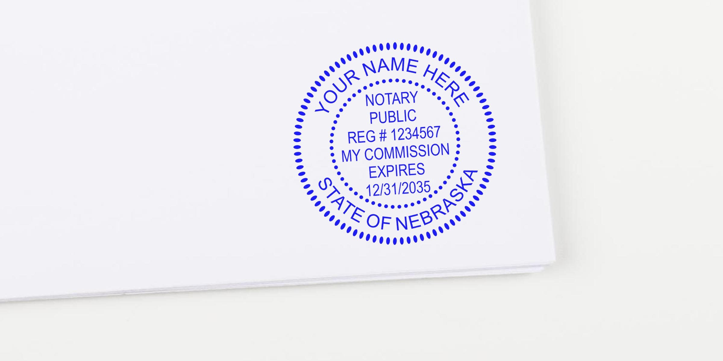 Nebraska notary stamp on white paper showing registration and commission expiration, featuring NE Notary Supplies and Upgrade Toolkit.