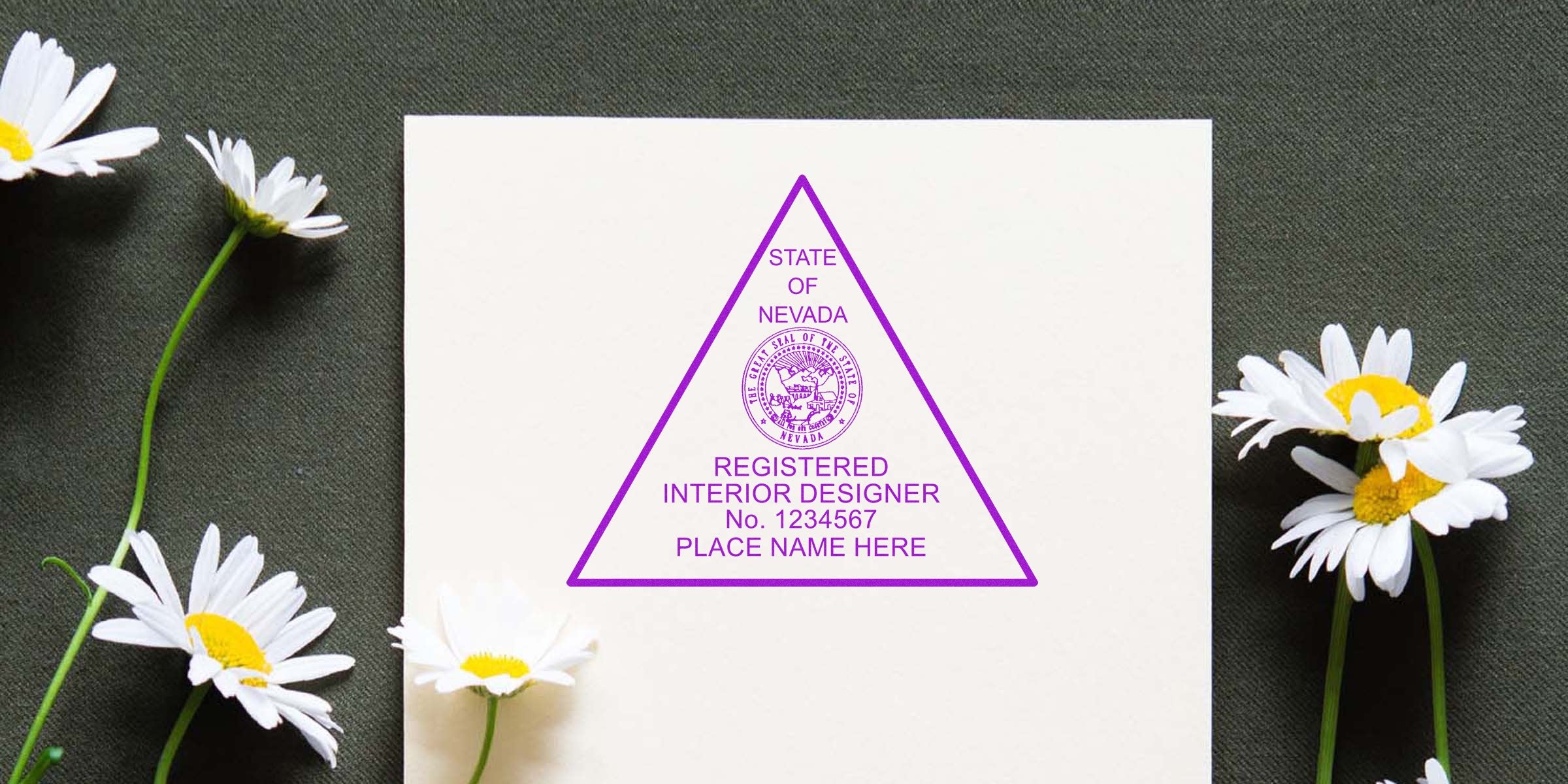 Nevada interior designer certificate with custom seal and personalized stamp, decorated with daisies on a dark fabric background.