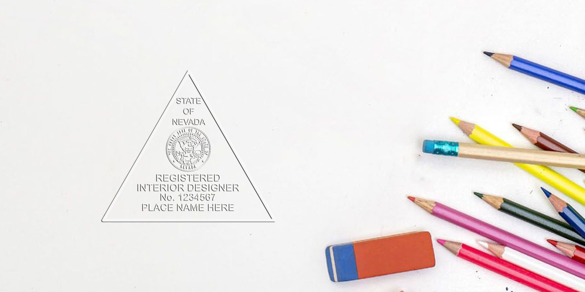 Nevada interior designer certification seal with a unique stamp, colorful pencils, and an eraser on a white background.
