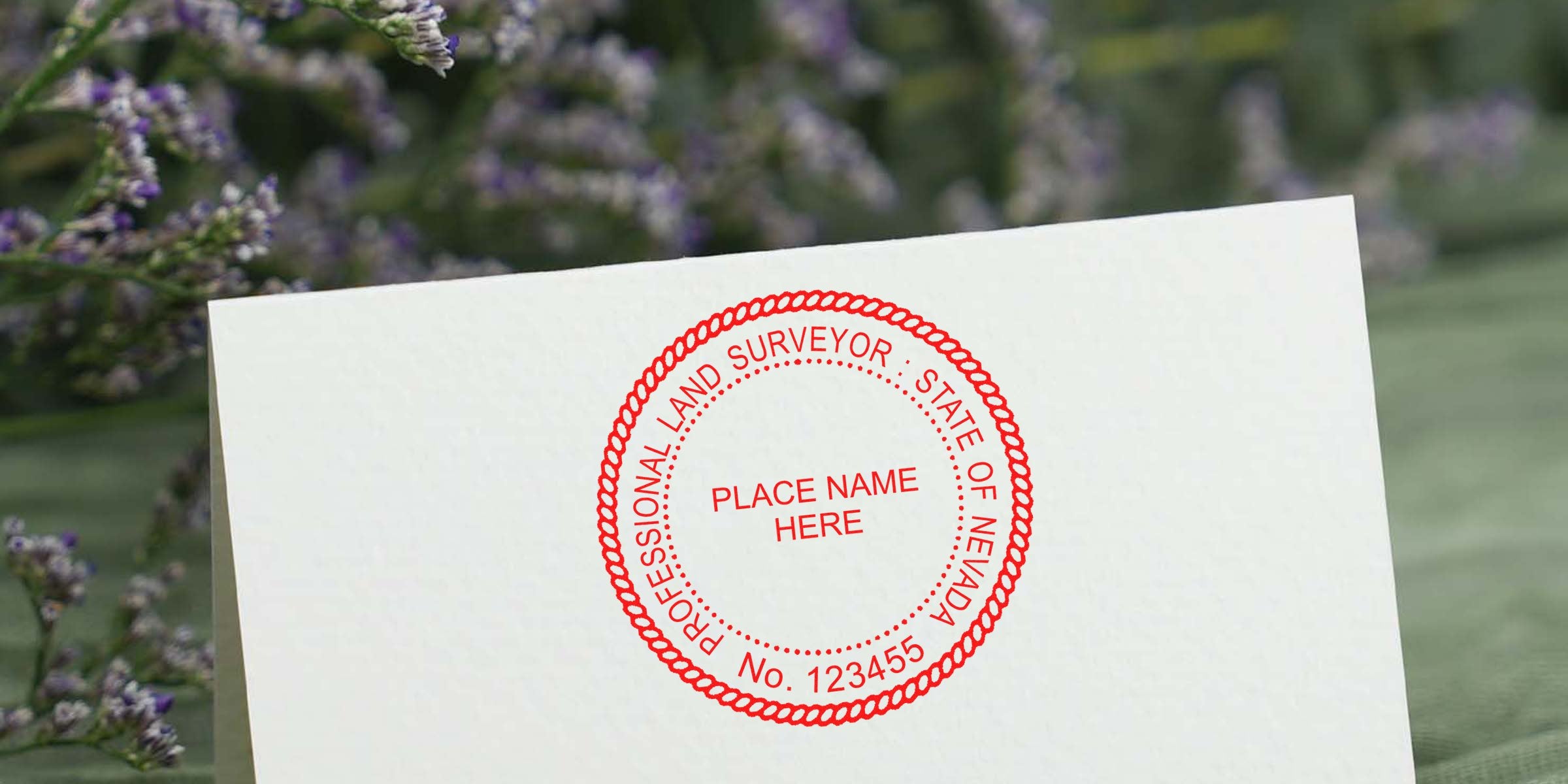 Nevada land surveyor seal stamped on white paper with a floral background, symbolizing land surveying in Nevada.