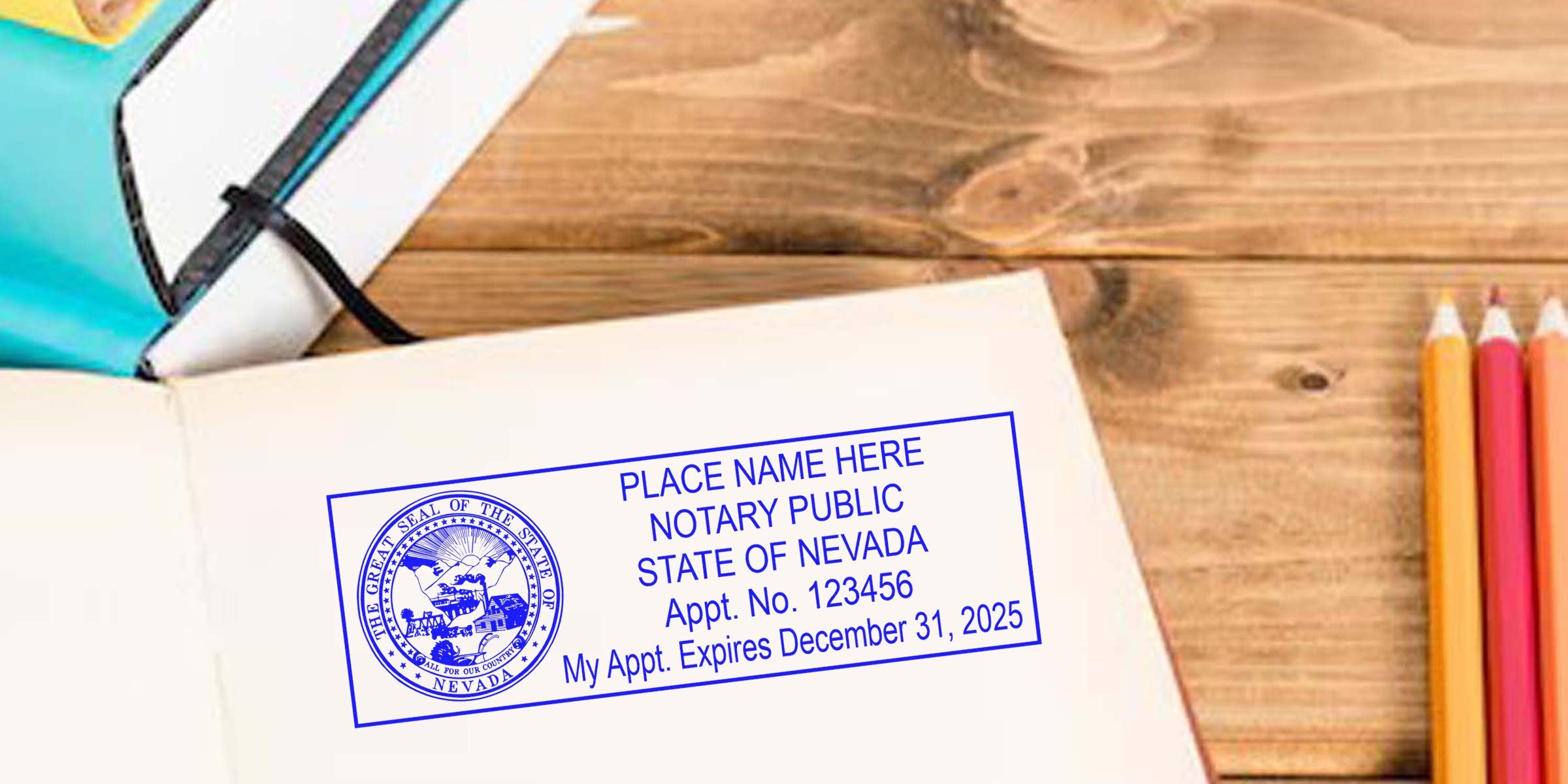 Nevada notary seal stamped on an open notebook with colored pencils on a wooden desk, showing a notary stamp guide.