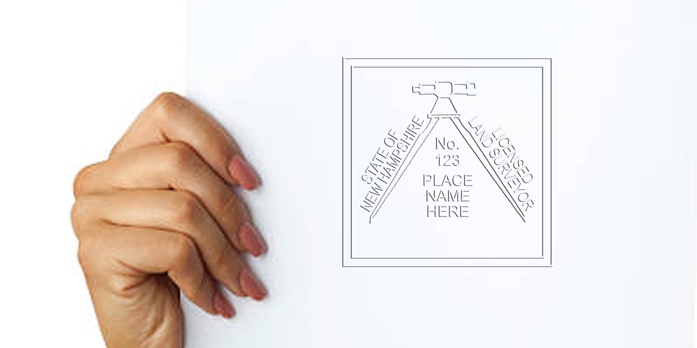 Hand holding New Hampshire land surveyor stamp with licensed marker, place name, and number for property boundary identification, highlighting land surveyor stamp design tips.
