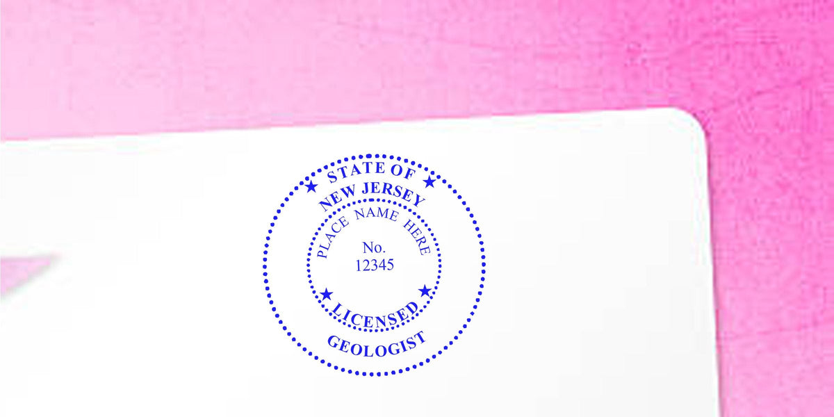 New Jersey Licensed Geologist Seal on white paper with pink background, highlighting NJ Licensed Geologist Requirements.