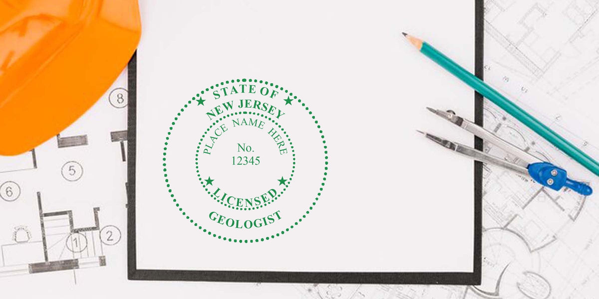 Professional Geologist Certification stamp on blueprint with orange helmet and drafting tools, showing Geologist Stamp New Jersey.