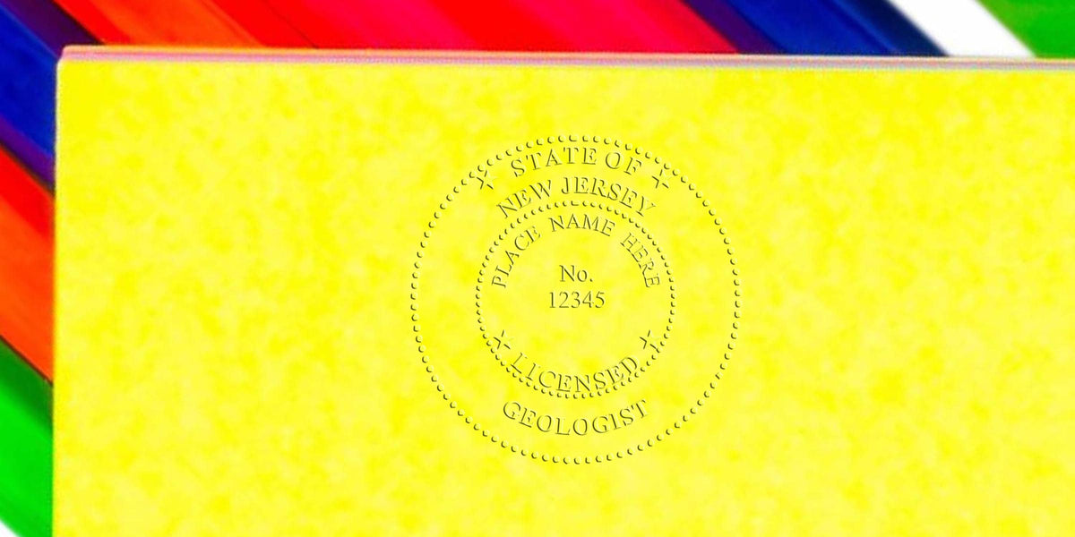 Licensed New Jersey geologist seal embossed on a vibrant background, fully compliant with geologist seal standards.