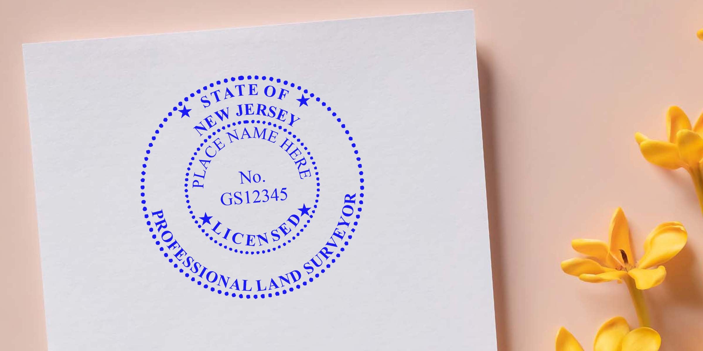 New Jersey land surveyor stamp on white paper with yellow flowers, meeting NJ land surveyor stamp requirements.