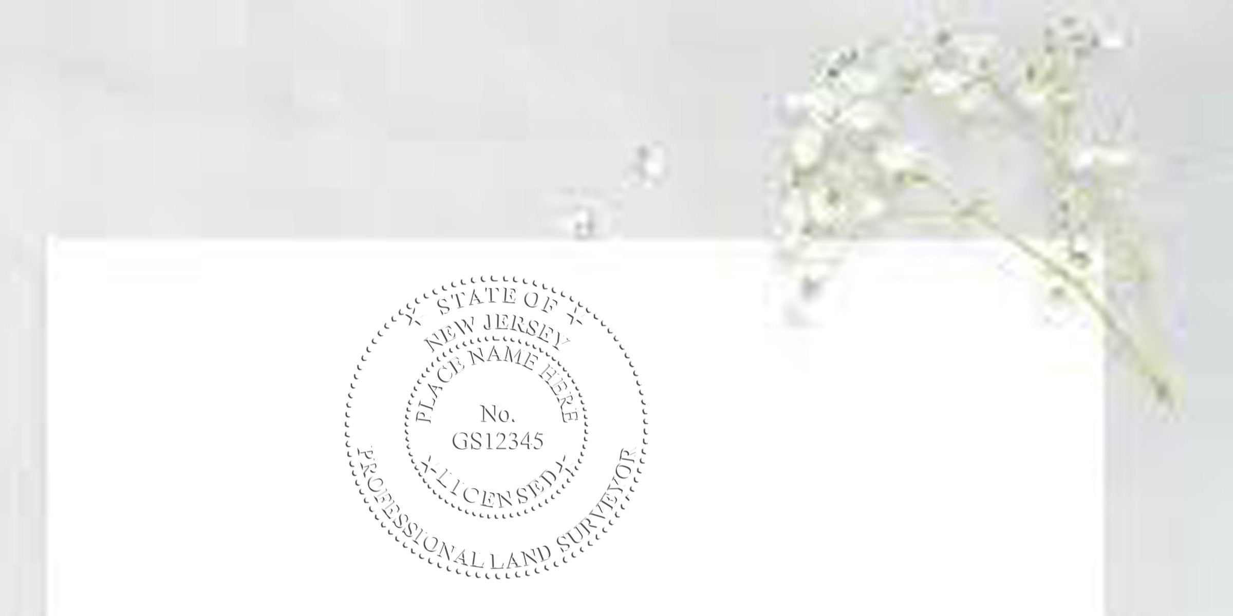 New Jersey land surveyor stamp embossed on white paper with delicate white flowers, official certification seal for land surveying services, emphasizing New Jersey land surveyor stamp purchase.