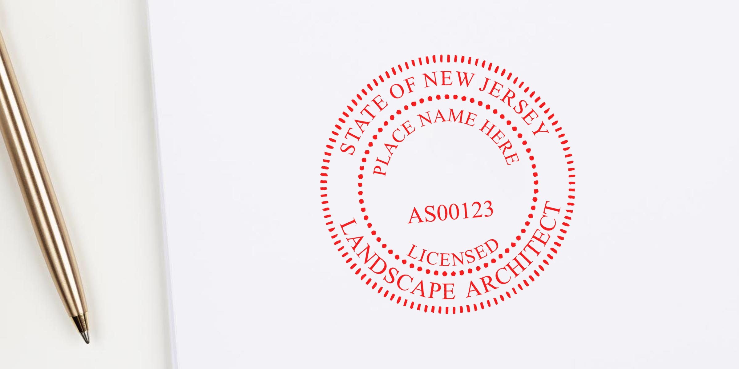 New Jersey landscape architect stamp on white paper with pen, adhering to landscape architect stamp guidelines.