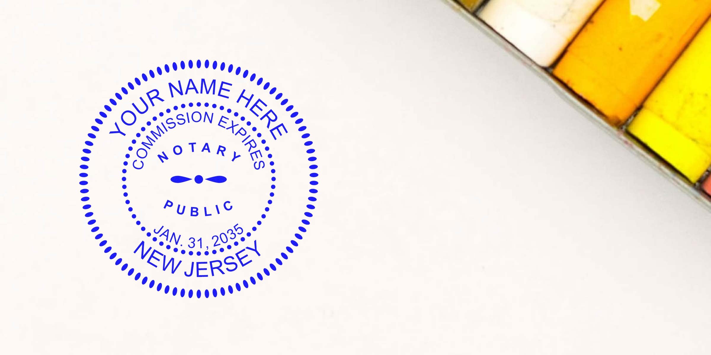 New Jersey notary stamp with commission expiry, colorful pastels on white paper, featuring a self-inking stamp.