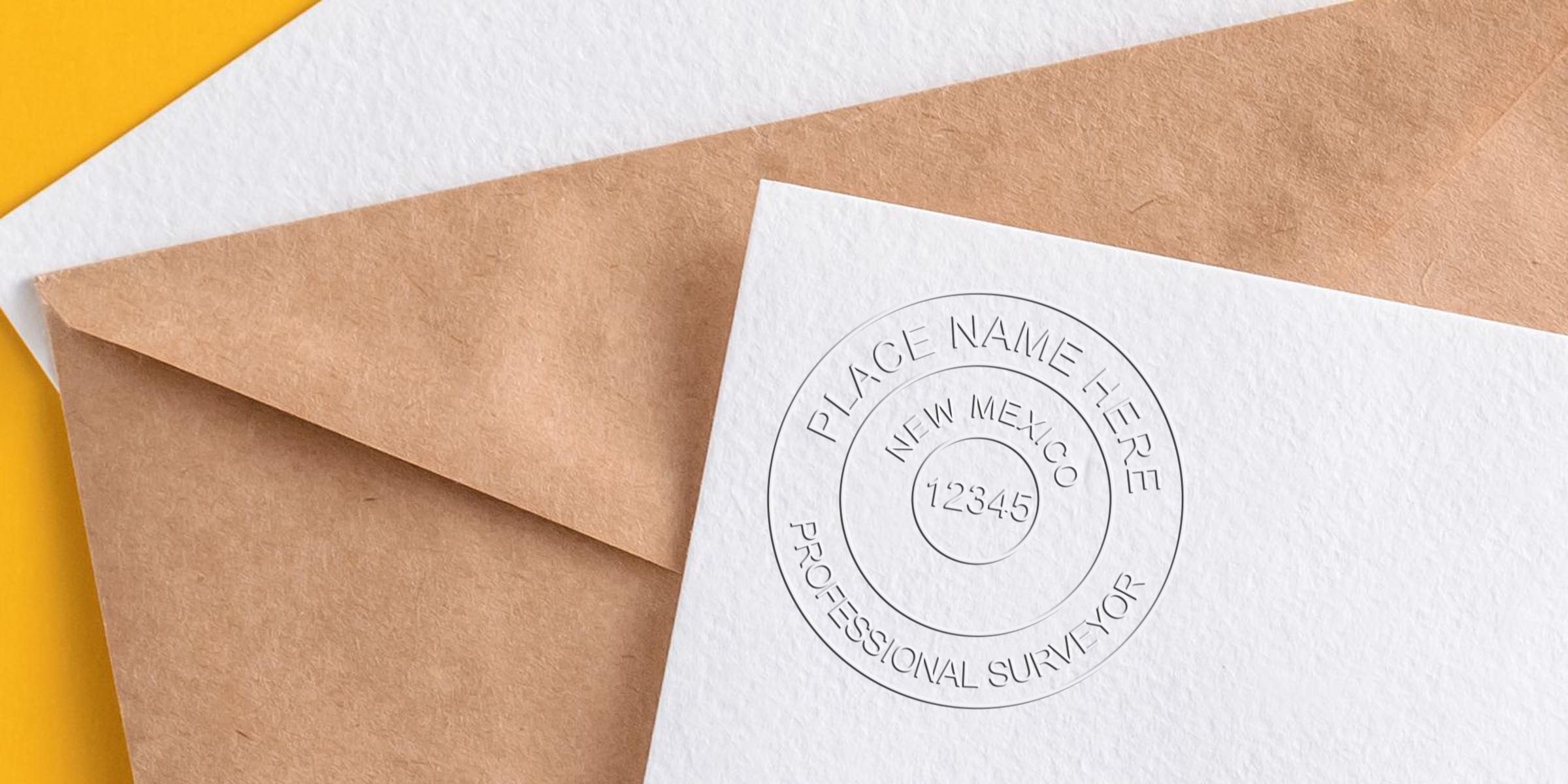 Custom professional New Mexico land surveyor stamp embossed on white paper with brown envelope background, compliant with NM land surveying standards.