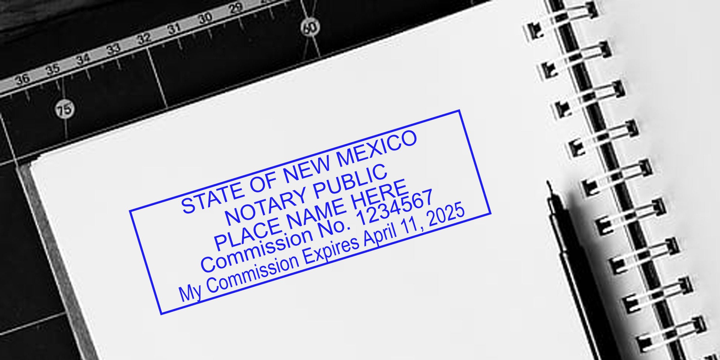 New Mexico notary seal stamped on notebook with pen, showing official commission expiration April 11, 2025, meeting legal document verification and notary public service requirements.