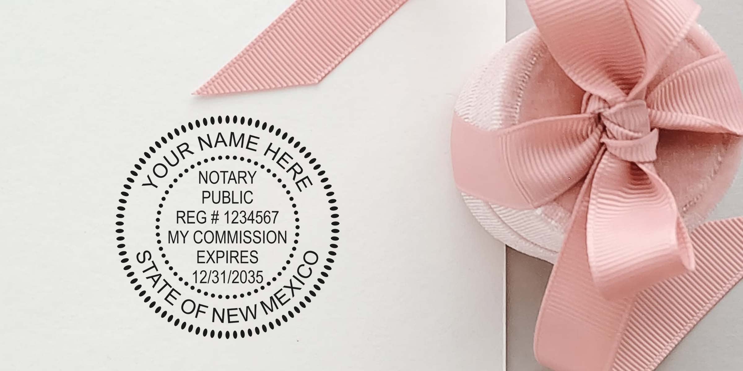 Custom New Mexico notary stamp with pink ribbon on white background, part of NM notary supplies and essentials.