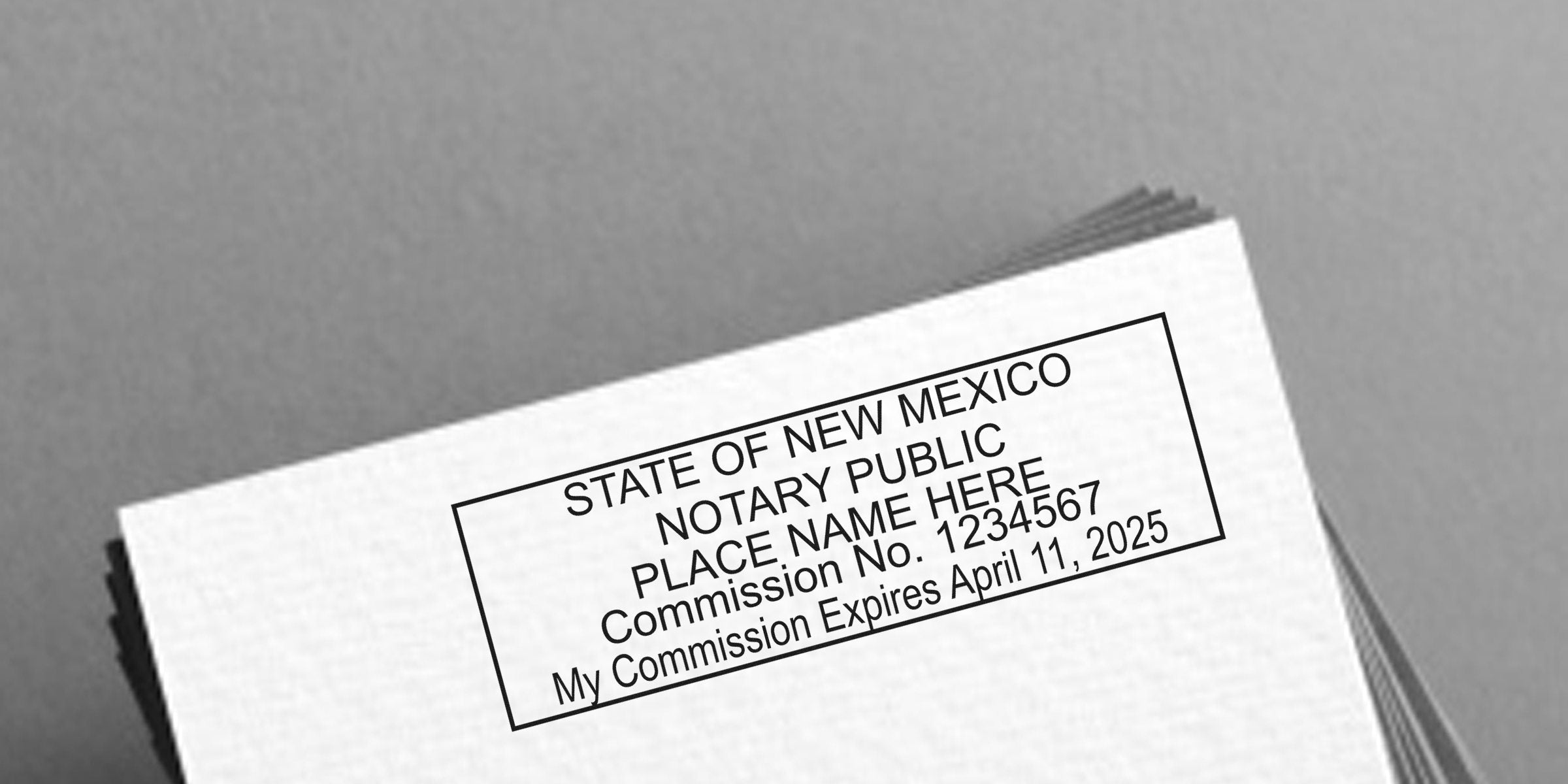 New Mexico notary stamp on paper, showing commission number and expiration date, with a self-inking design.