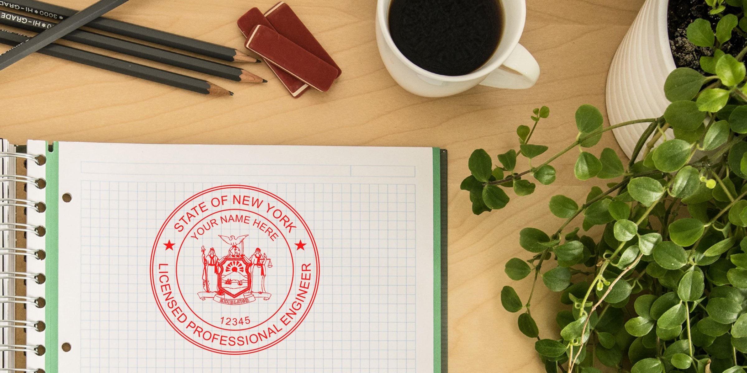 Engineer Stamp NYC on notebook with pencils, coffee cup, and green plant on wooden desk, showcasing the Best Engineer Stamp New York.