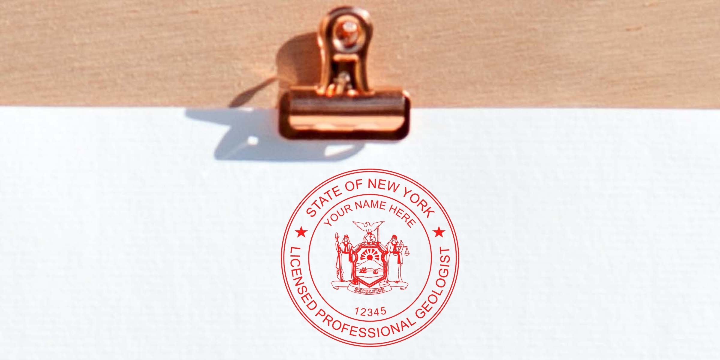 Geologist Seal New York on white paper with copper clip, showing Professional Geologist Stamp.