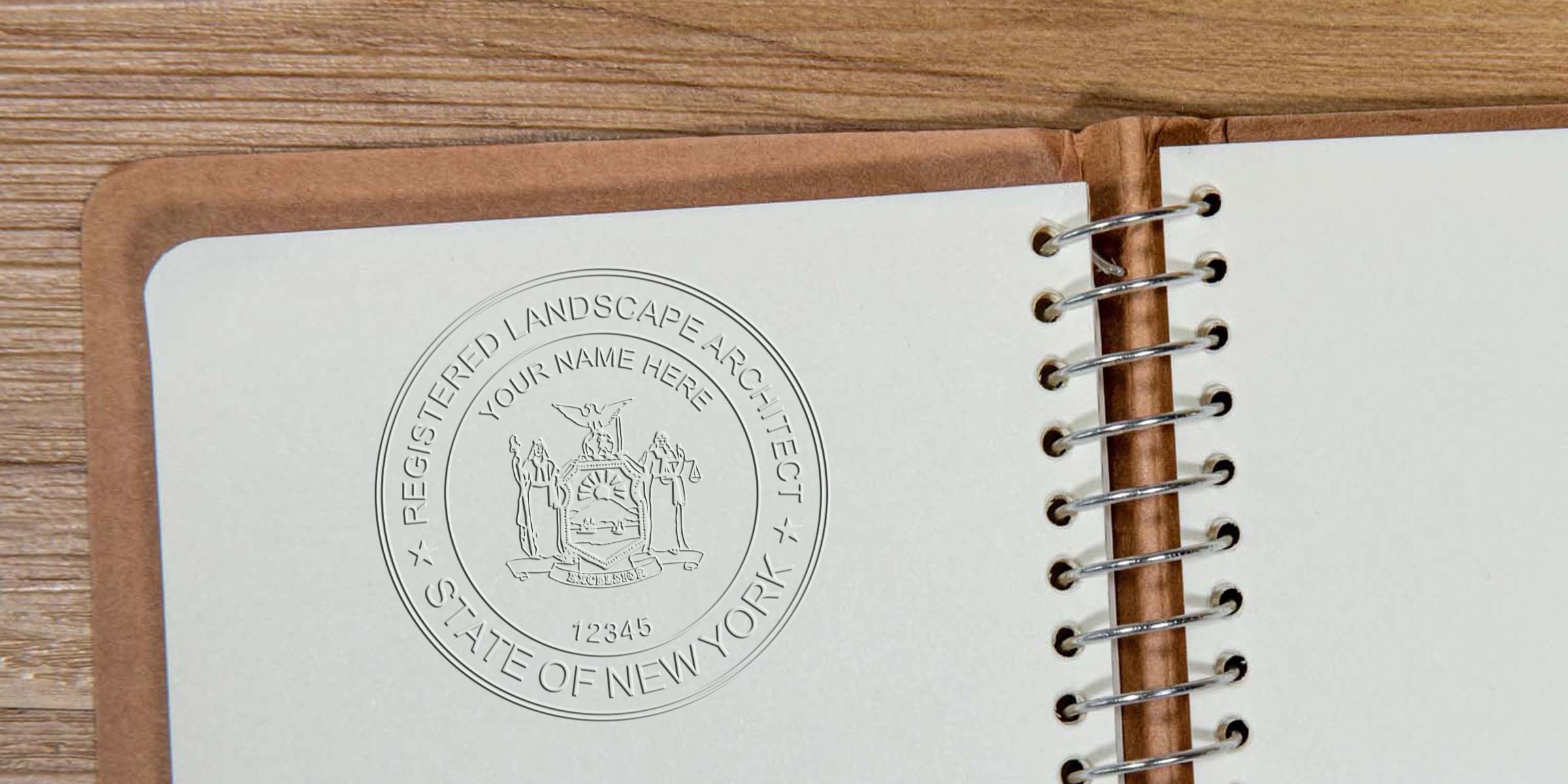 Embossed seal of a registered New York landscape architect on a notebook page, symbolizing licensing requirements.