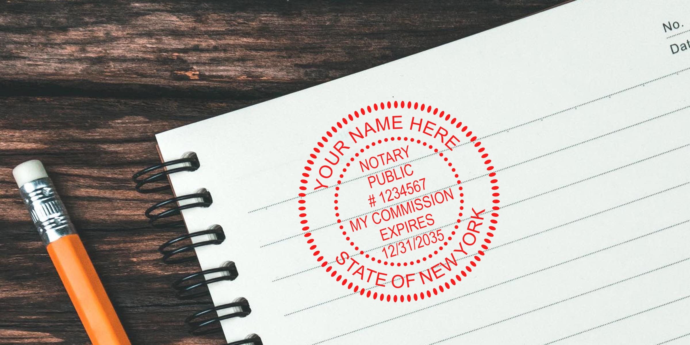 New York notary seal on a notebook with a pencil, showing a guide for New York notary stamp services.