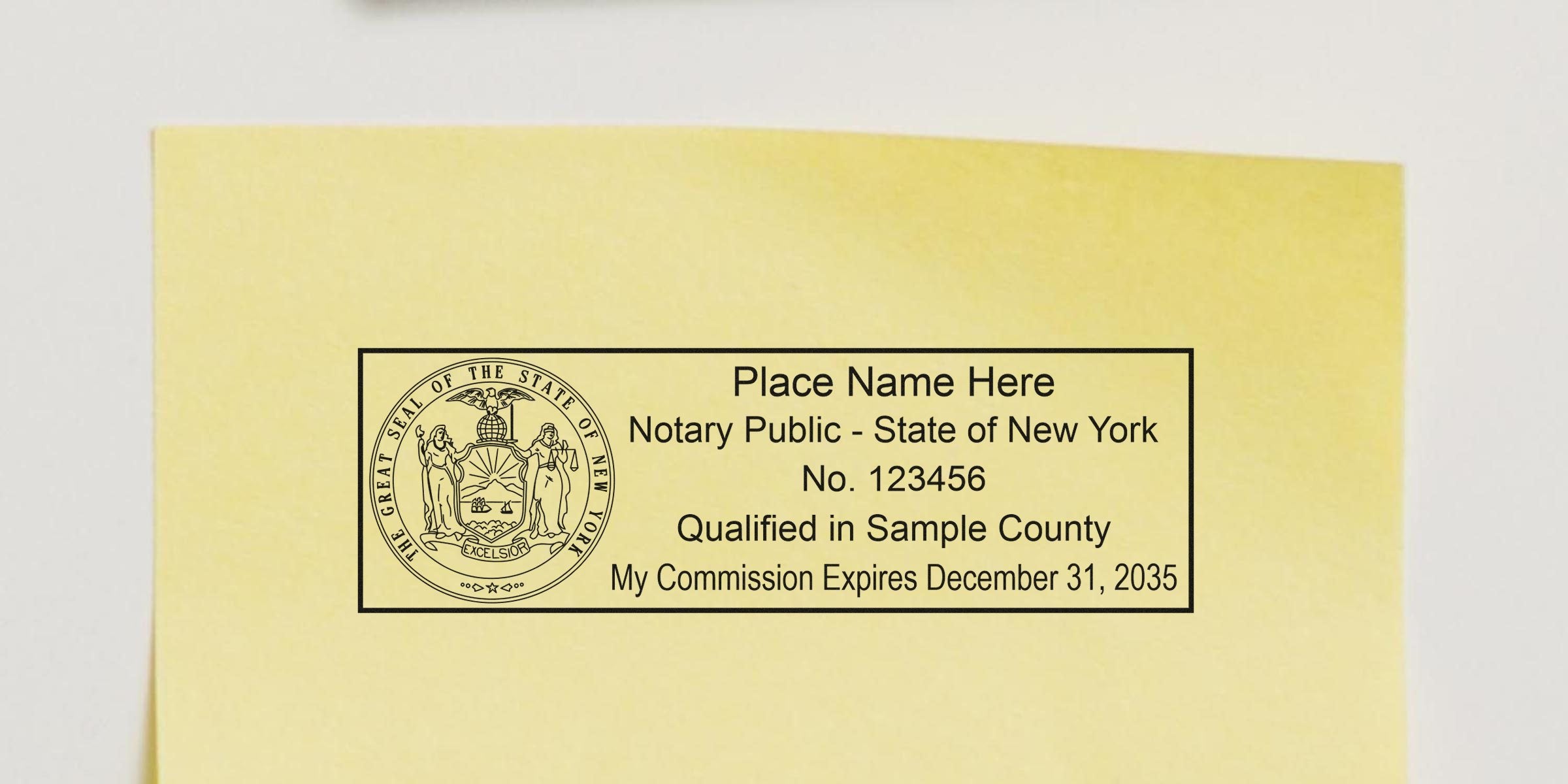 New York notary public stamp on yellow paper with state seal and commission expiration date, essential for NYC notary supplies and tools.