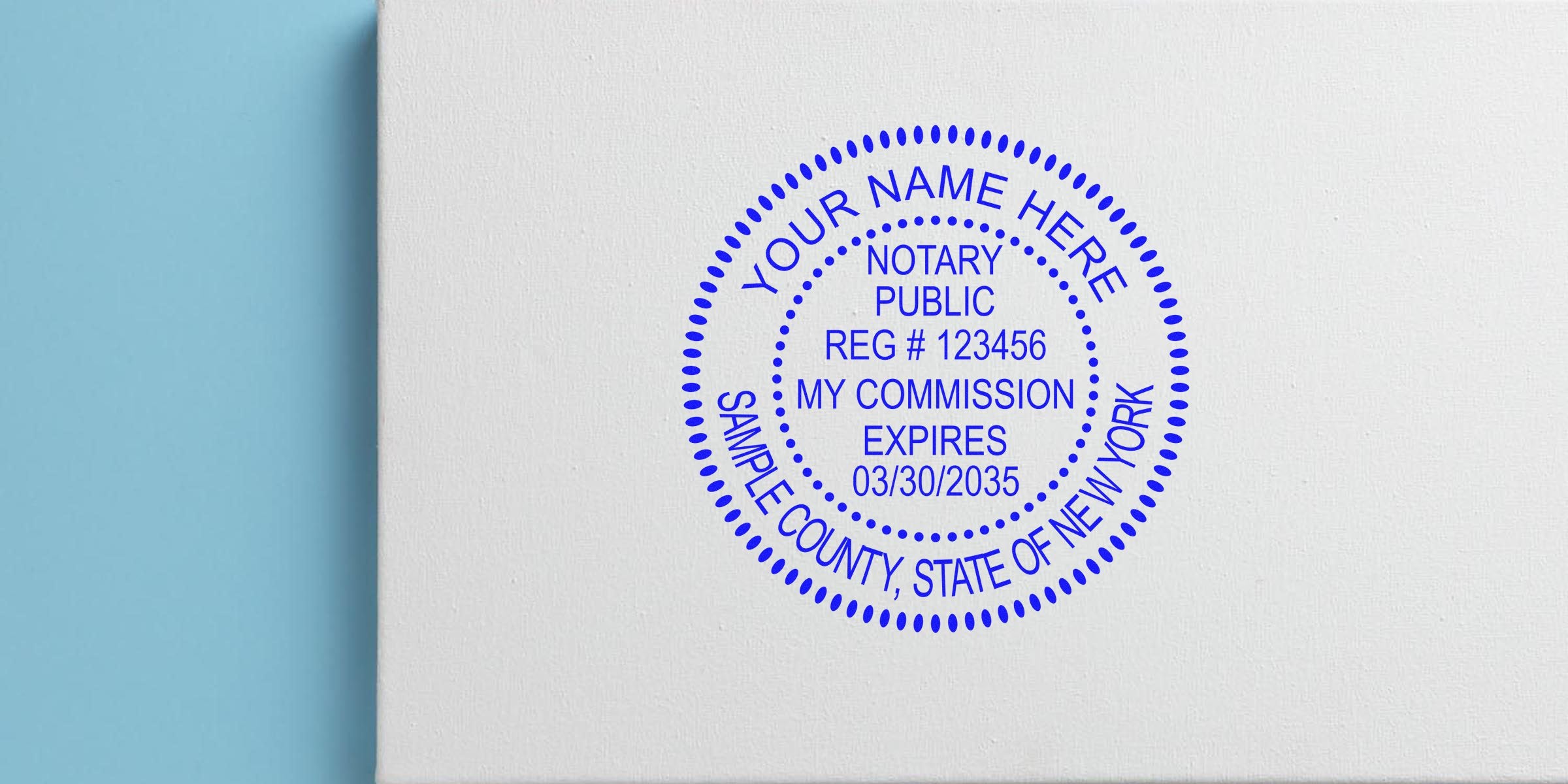 Blue New York notary seal on white paper showing commission expiration date, highlighting seal expiration and renewal process.