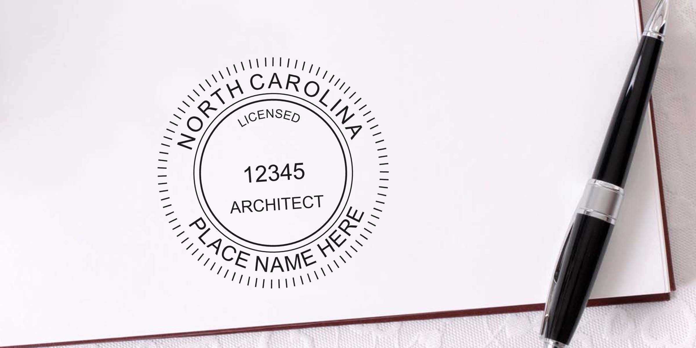 North Carolina architect seal on white paper with pen, showing design requirements for professional certification.