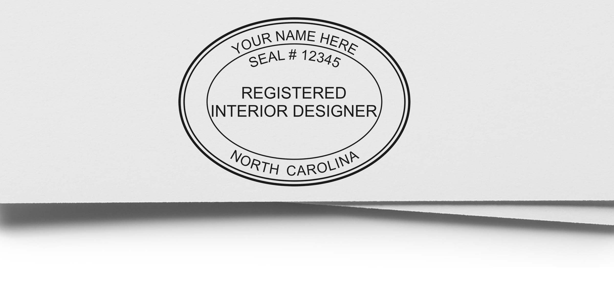 Registered interior designer seal on white paper with North Carolina interior designer stamp for certification and NC interior design license.